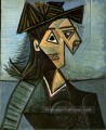 Buste de femme au chapeau une fleurs 1942 cubisme Pablo Picasso